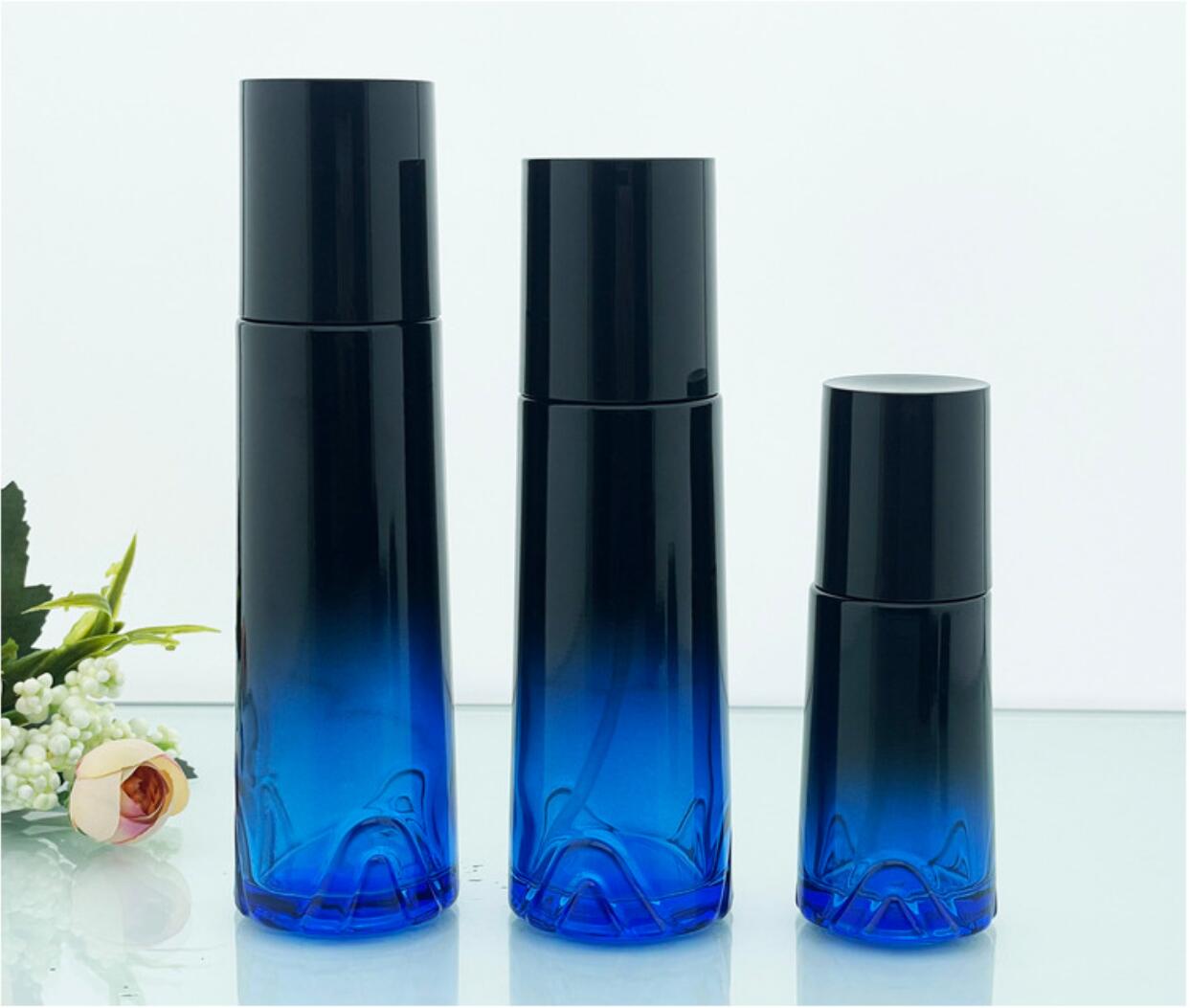 high quality luxury drak blue cosmetic glass bottle set cosmetic glass package wholeslale