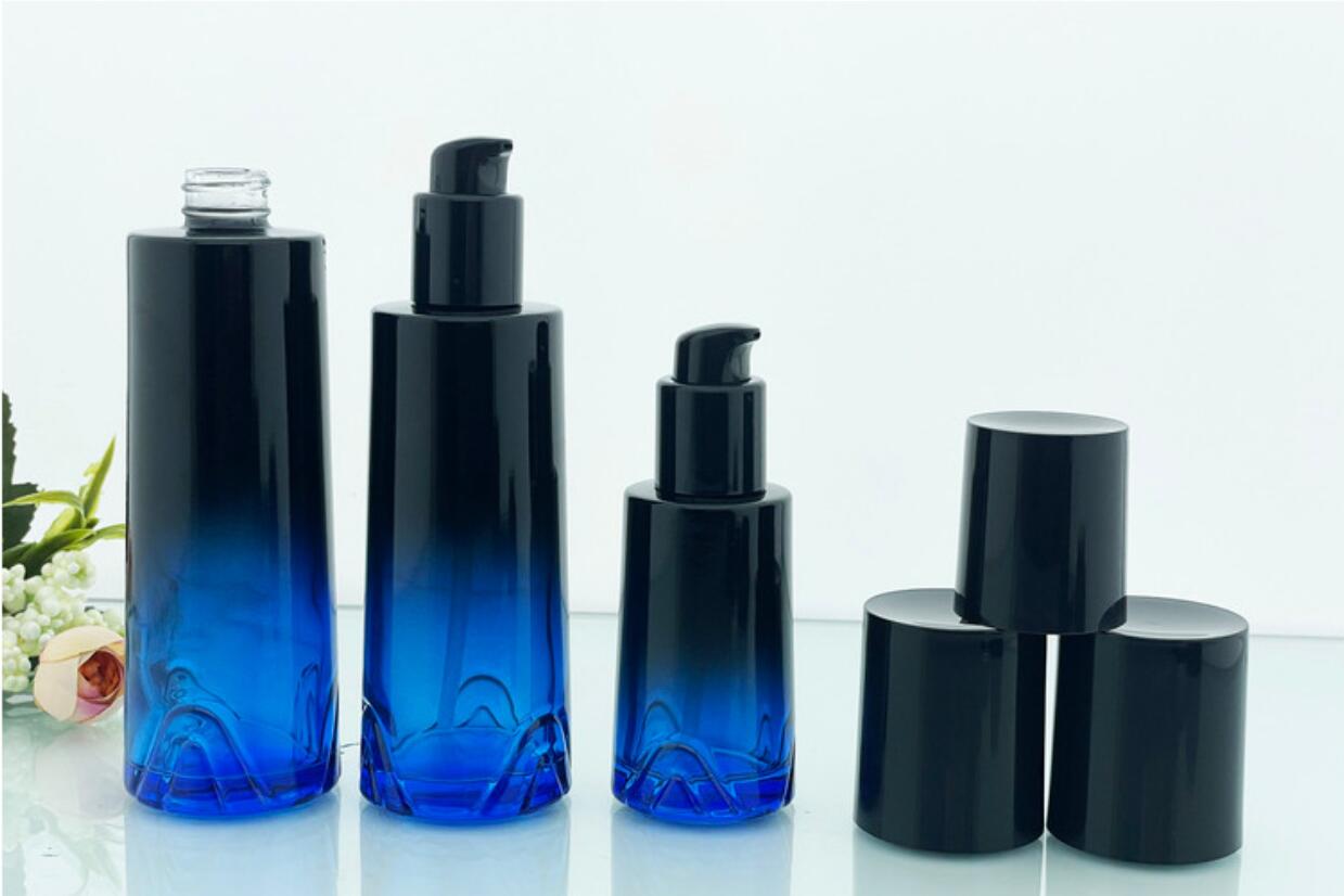 high quality luxury drak blue cosmetic glass bottle set cosmetic glass package wholeslale