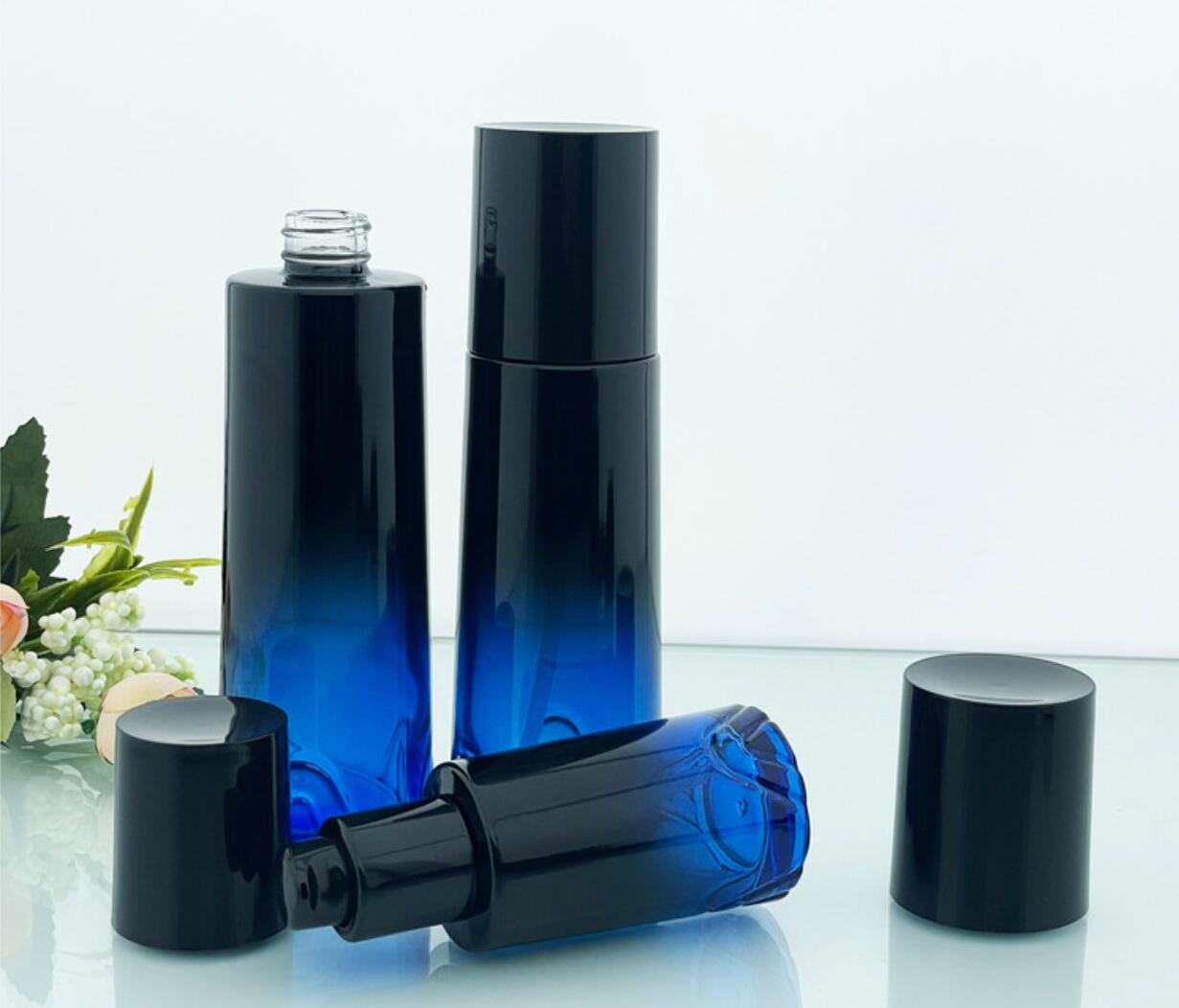 high quality luxury drak blue cosmetic glass bottle set cosmetic glass package wholeslale