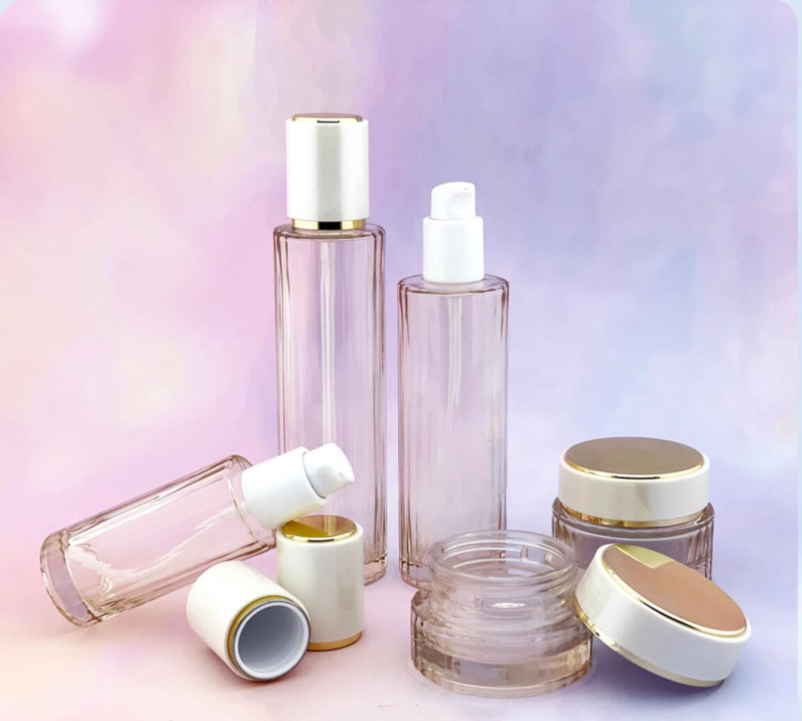 Skincare bottle set round shape 40ml 100ml 120ml serum lotion pump glass bottle spray 50g glass cream jar with white cap