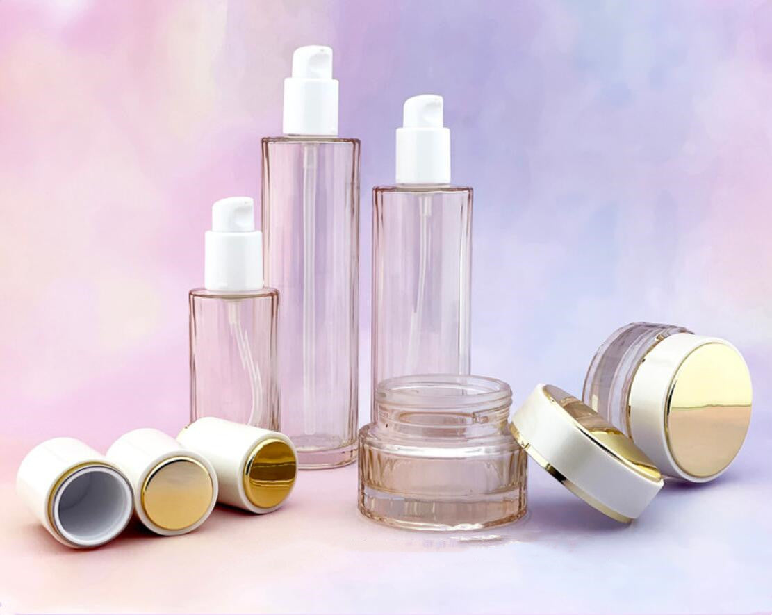 Skincare bottle set round shape 40ml 100ml 120ml serum lotion pump glass bottle spray 50g glass cream jar with white cap