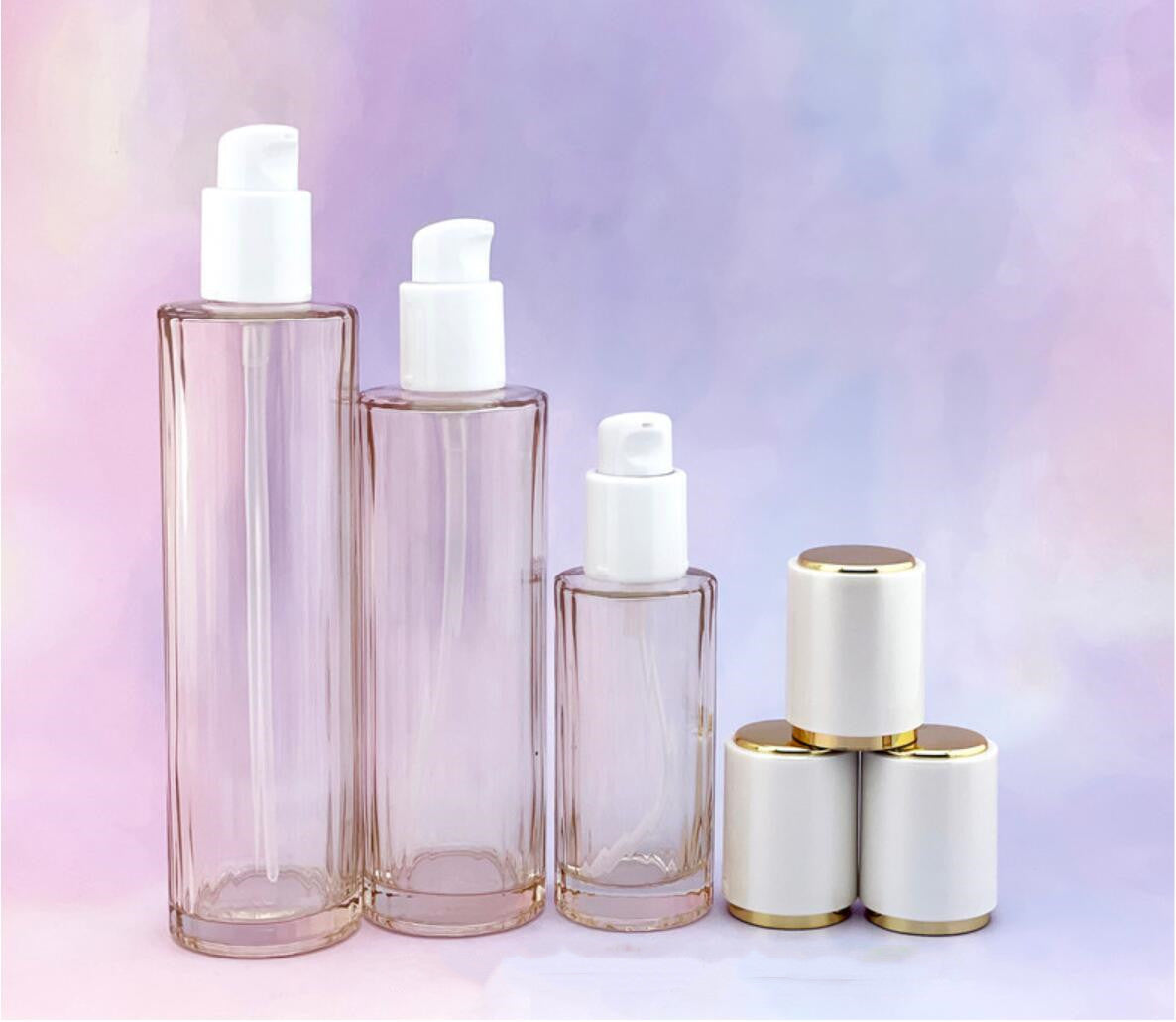 Skincare bottle set round shape 40ml 100ml 120ml serum lotion pump glass bottle spray 50g glass cream jar with white cap