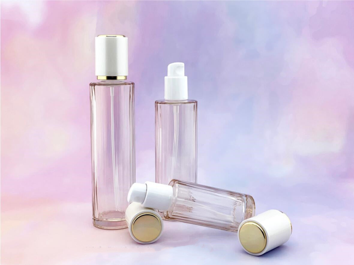 Skincare bottle set round shape 40ml 100ml 120ml serum lotion pump glass bottle spray 50g glass cream jar with white cap