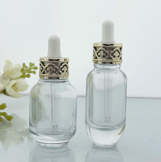 luxury 30ml 1 oz clear glass 30 ml cosmetic serum bottles with dropper cap gold white top for essential oil packaging