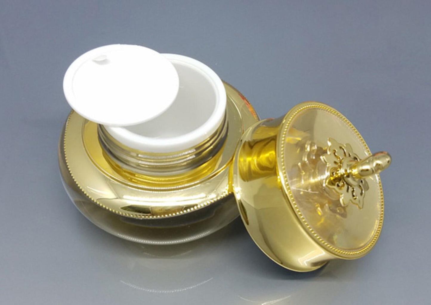 Factory wholesale gold jar with golden lid acrylic plastic empty cream packaging container cosmetic jar